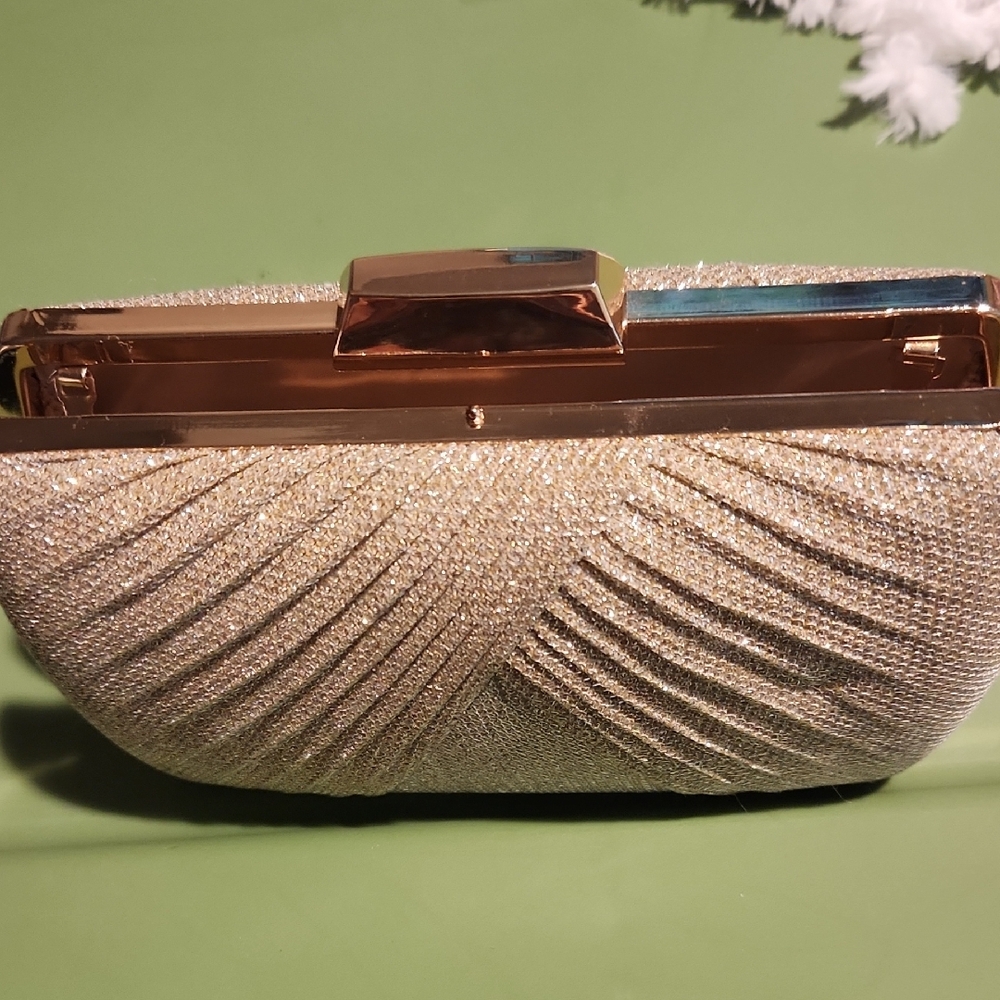 Gold Satin Wristlet with Elegant Pleated Design and Bronze Clasp. EUC-worn once